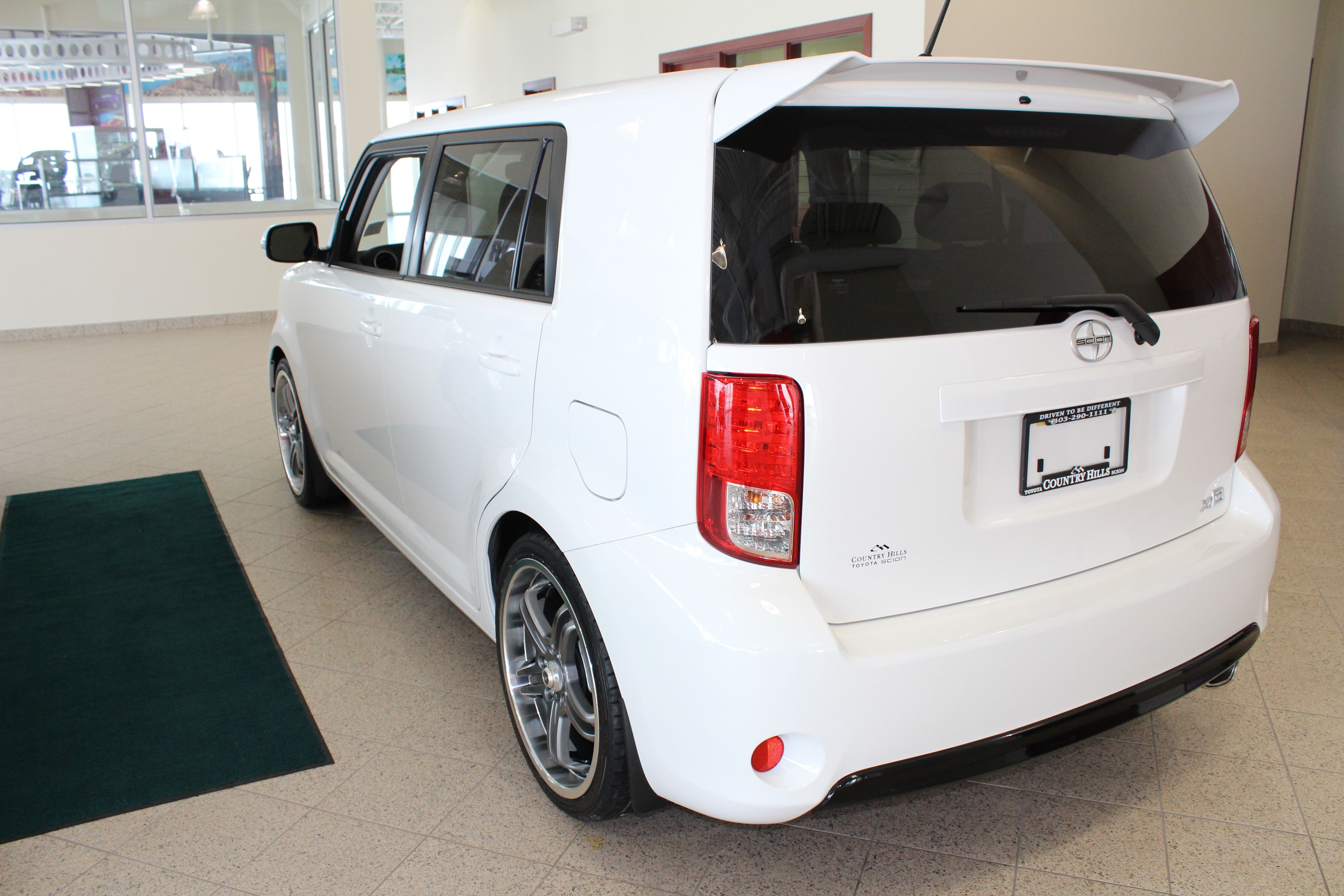 2013 Scion xB with TRD rims and exhaust rear spoiler