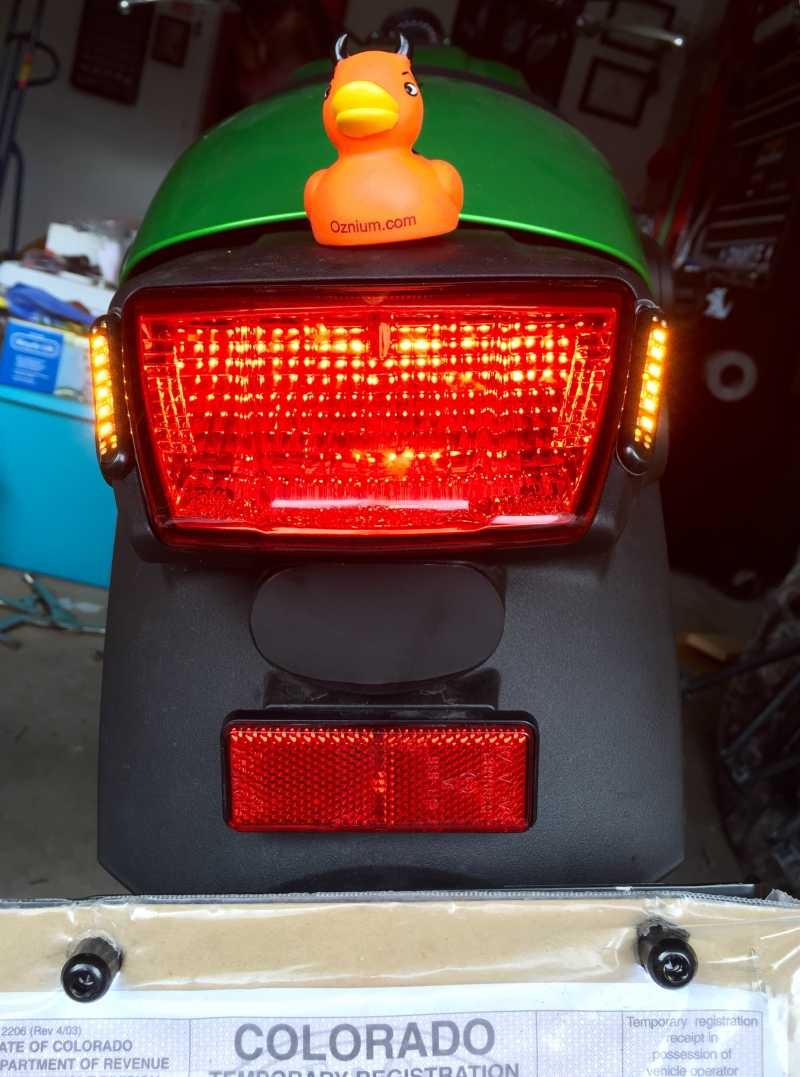 Side View LED Bolt Ozzie the Oznium duck showing off the LED bolts and