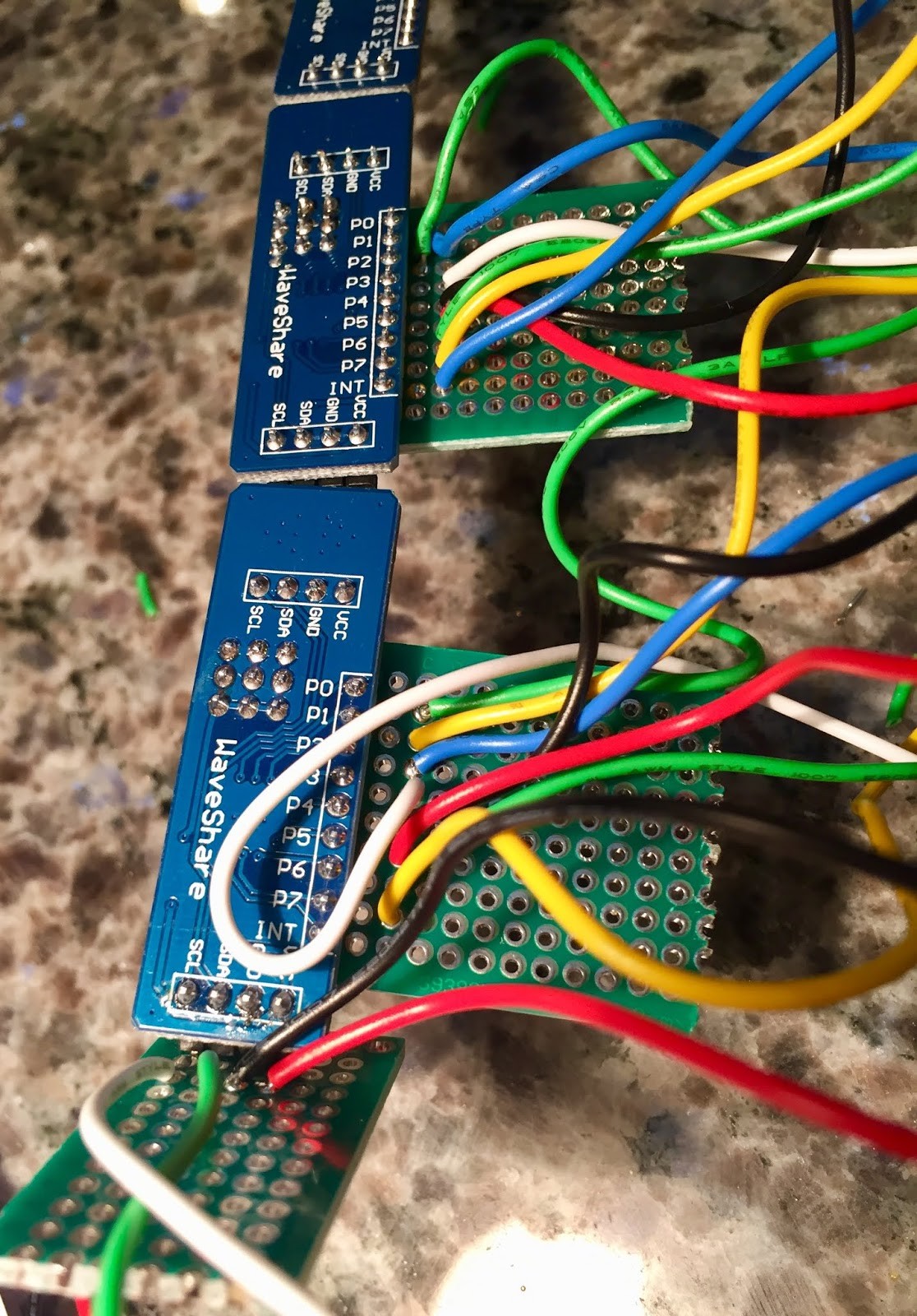 I2C chain of I O expander boards to drive LEDs and record some inputs